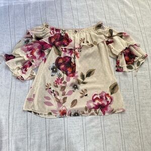 White House Black Market off the shoulder floral peasant blouse.